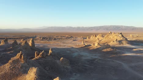 Desert-Landscape-with-a-sunset,-stones,-bushes-and-the-sky