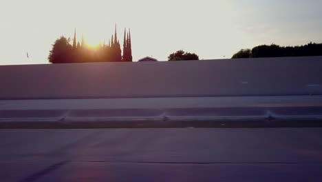 Low-Angle-fly-through-Los-Angeles-river-past-trees