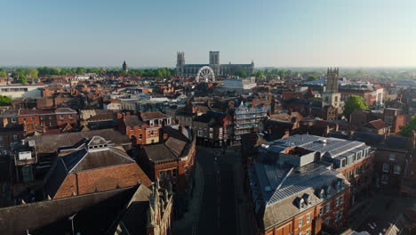 establishing wide angle drone shot over york uk on sunny morning uk