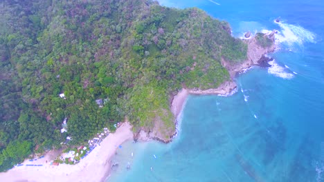 Aerial-view-looking-down-on-a-beautiful-white-sand-beach-along-the-coast-of-the-Tortuga-Islands-in-Costa-Rica