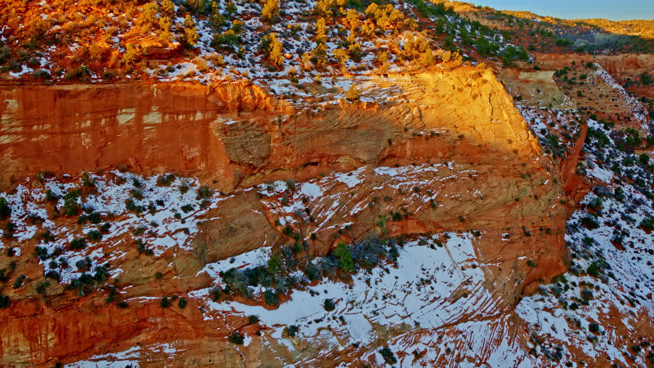 Flying over the surreal red-rock formations of the canyonlands by Page, Arizona.