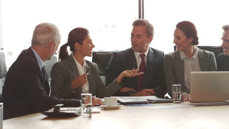 smiling business people having a meeting