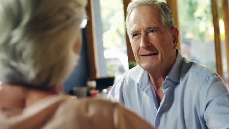 senior couple talking to each other in the cafe 4k