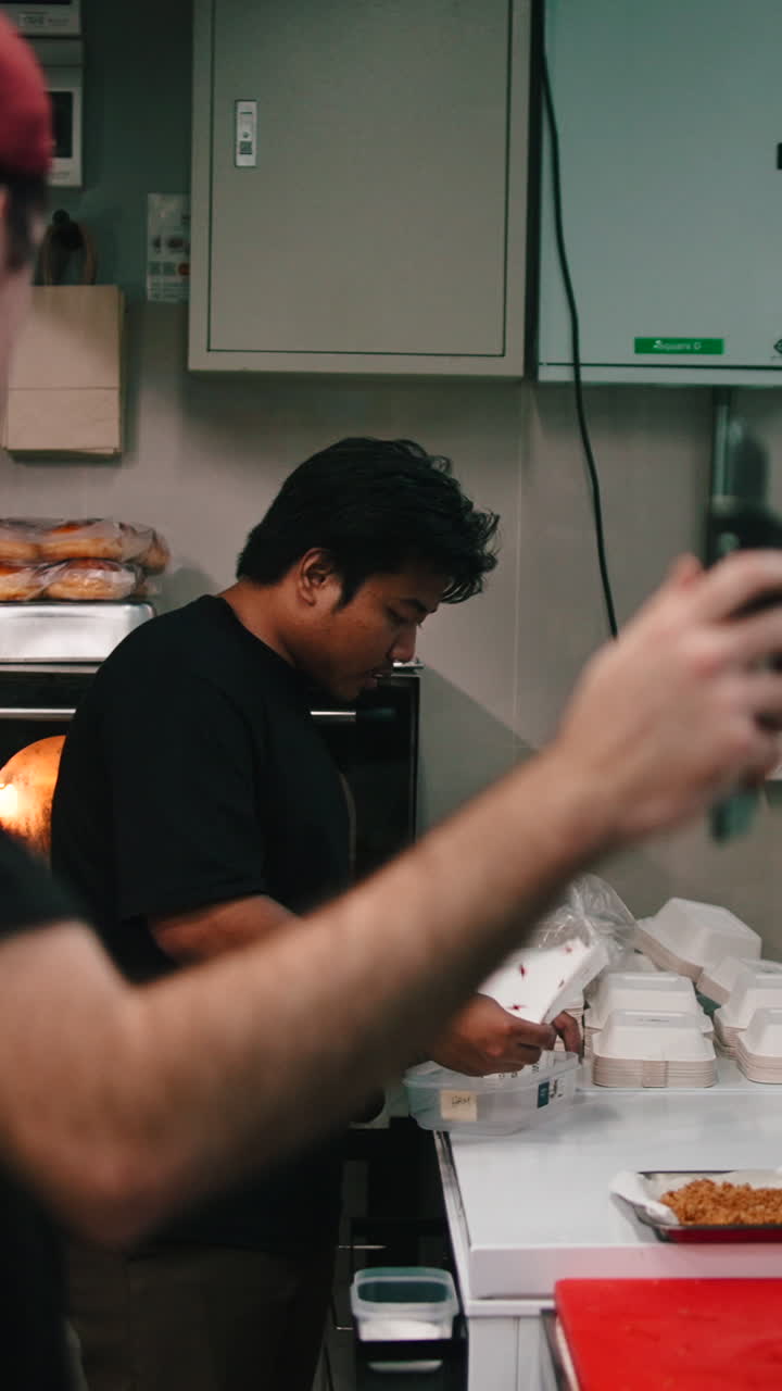 People preparing food in a kitchen