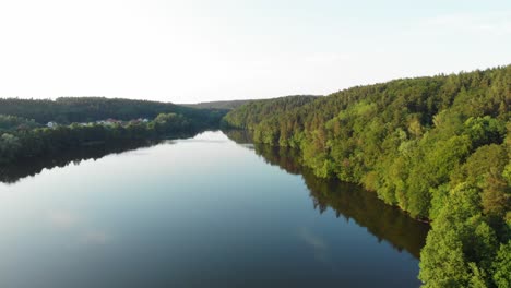 Łapino-lake-in-pomeranian-district-dolly-shot-from-a-drone