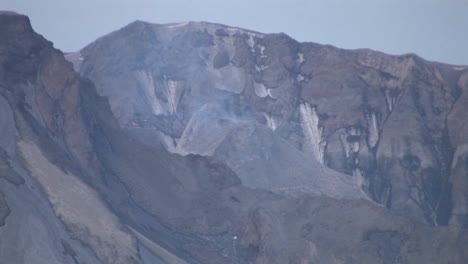 Smoke-rises-from-a-rocky-mountain-at-Mt-St-Helens-National-Park