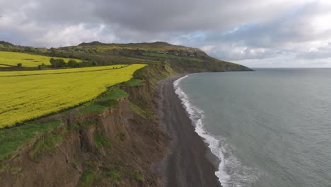 stunning sunrise over rapessed field in greystones3 - 4k cinematic drone footage - wicklow - ireland