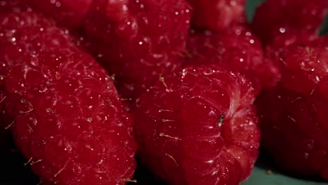a closeup view of fresh, ripe raspberries, highlighting their vibrant color and delightful texture