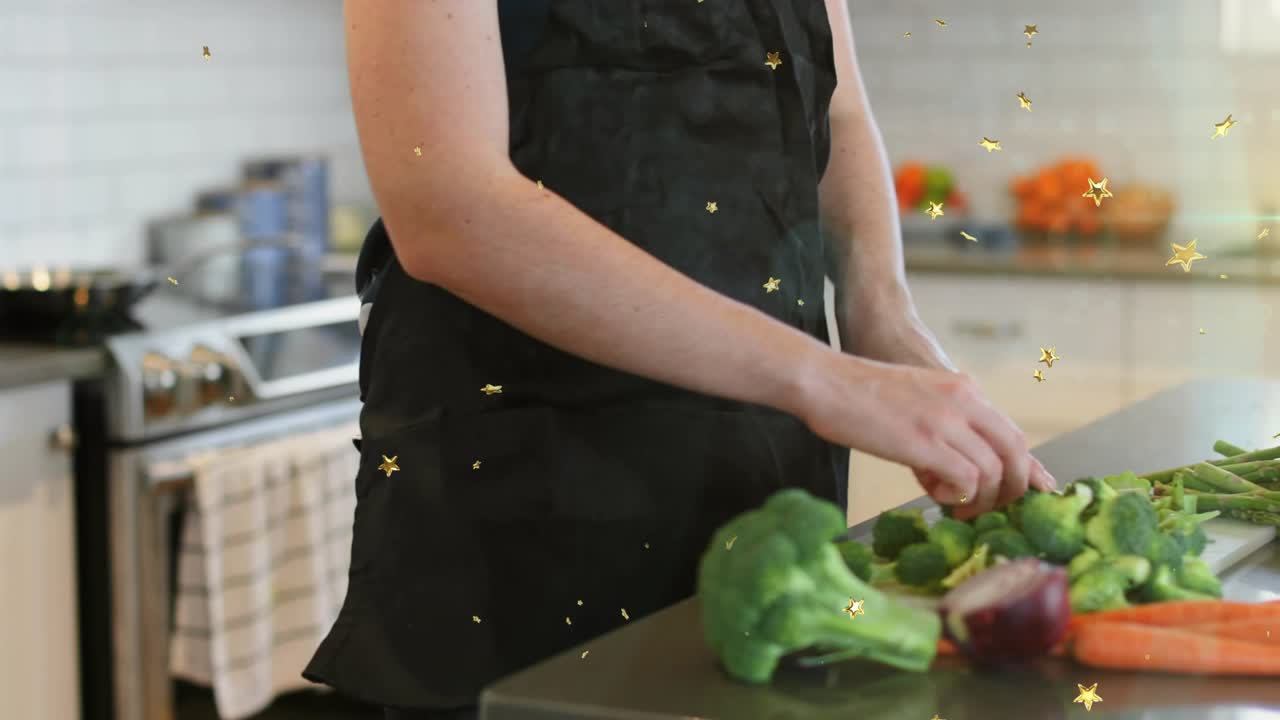 Woman grabbing Brussels sprout and peeling leaves then slicing on cutting board for culinary prep