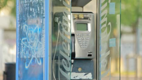 telephone booth on street modern city. old phone booth. public telephone