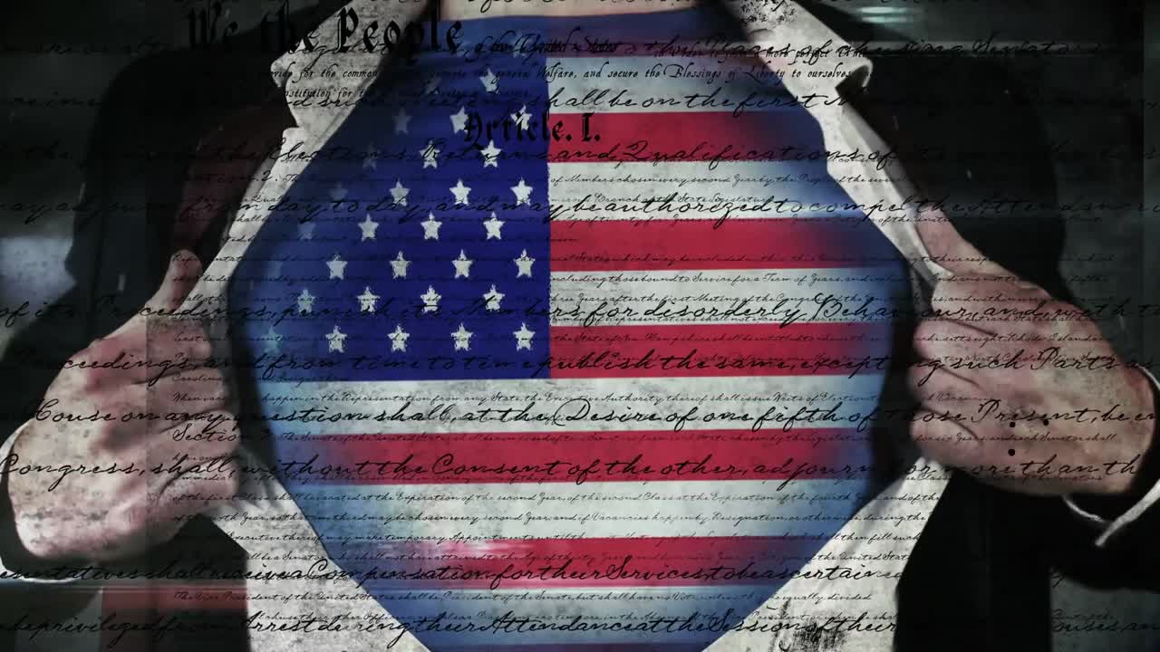 Man opening shirt to show American flag and the written constitution of the United States