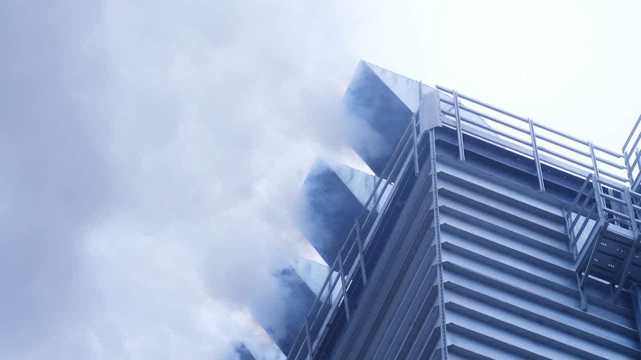 Grain processing works. Smoke comes out of the chimneys of the plant