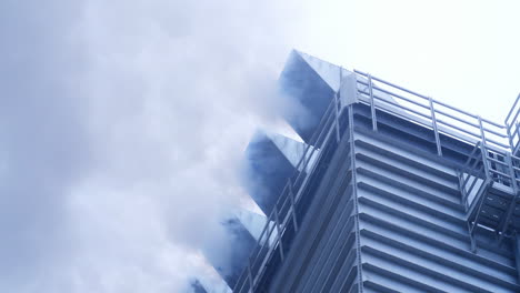 grain processing works. smoke comes out of the chimneys of the plant