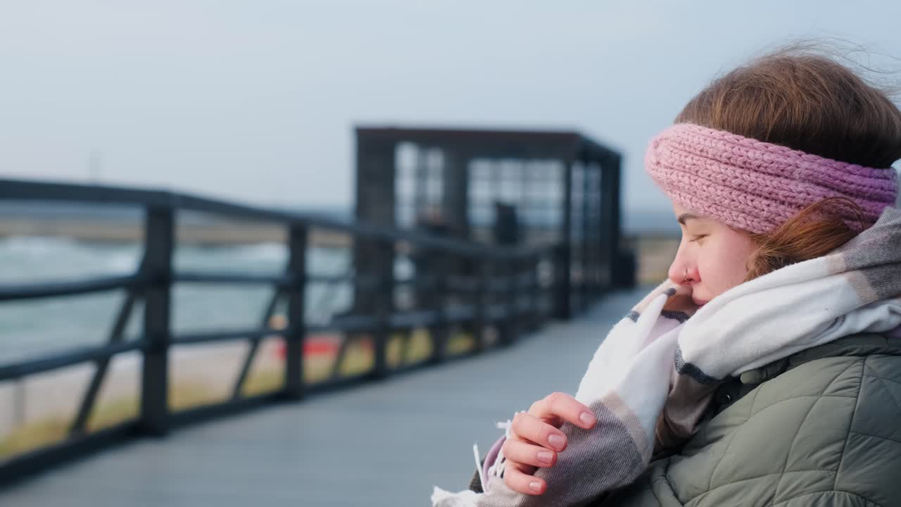 Woman on a Pier in Autumn