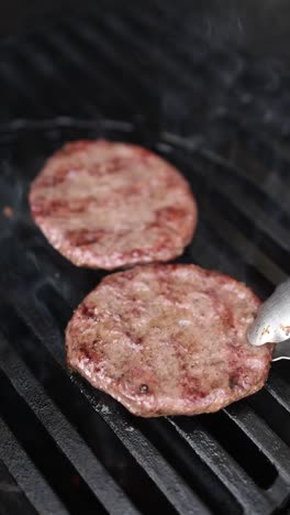 cooking hamburgers on a grill