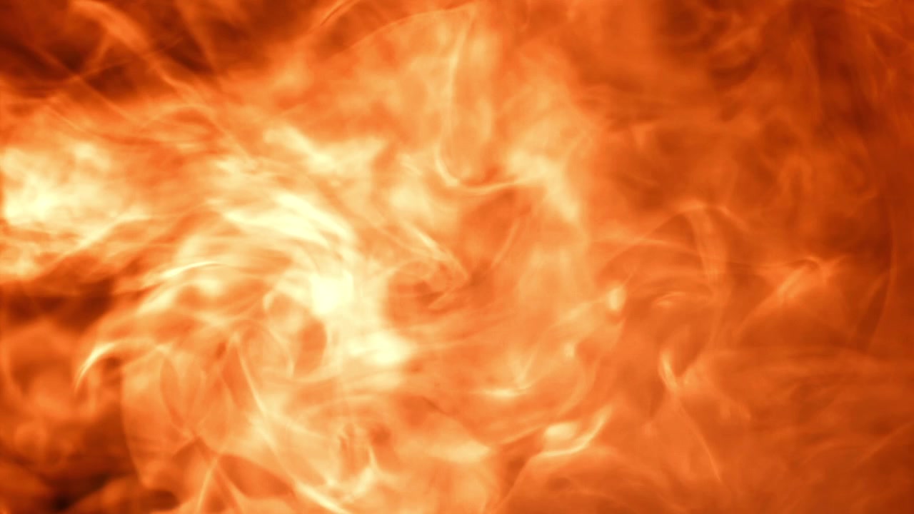 Texture dinamica di fumo e fuoco rosso e arancione su sfondo nero