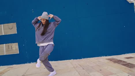 woman dancing in an urban setting