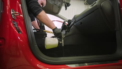 professional car cleaning. сar wash. dry cleaning and detailing of the cabin. deep cleaning of the body, seat cleaning. wiping foam in car wash. cleaning the car panel from dust. a vacuum cleaner