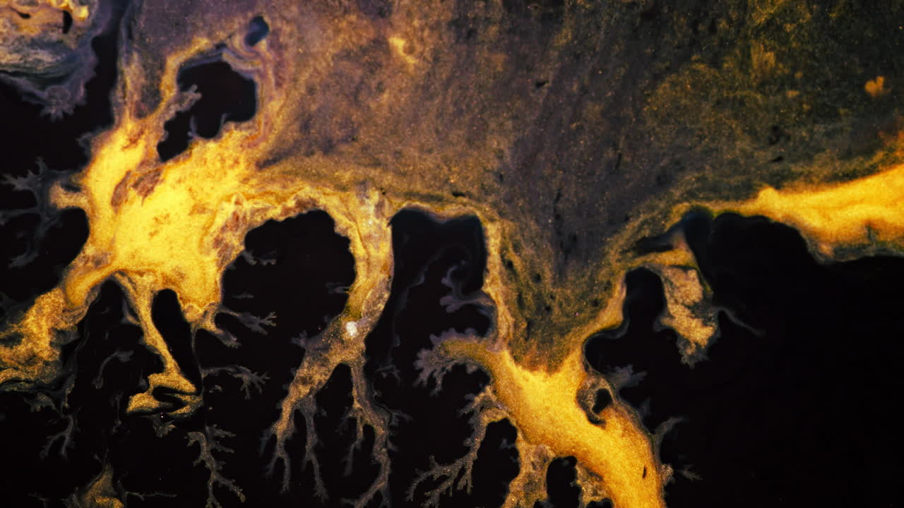 Substances blending and mixing in vibrant patterns, macro shot with detailed view