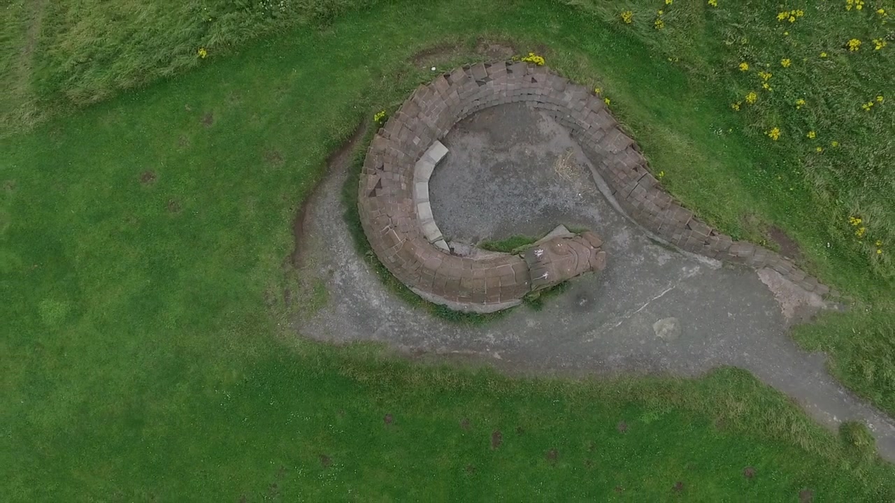 Drone Ascending Above the Stone Dragon at Irvine Beach Park
