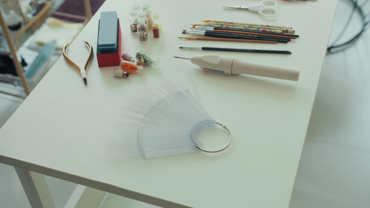 Tools for Nail Art on Table in Manicure Salon