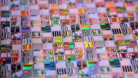 Silicon-semiconductor-wafer-close-up.-In-electronics,-a-wafer-also-called-a-slice-or-substrate-is-a-thin-slice-of-semiconductor,-a-crystalline-silicon,-used-for-the-fabrication-of-integrated-circuits