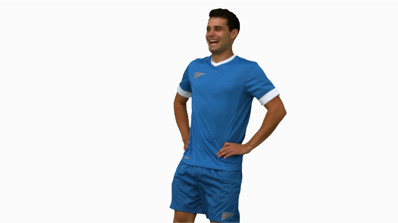 jogador de futebol a aquecer na tela branca