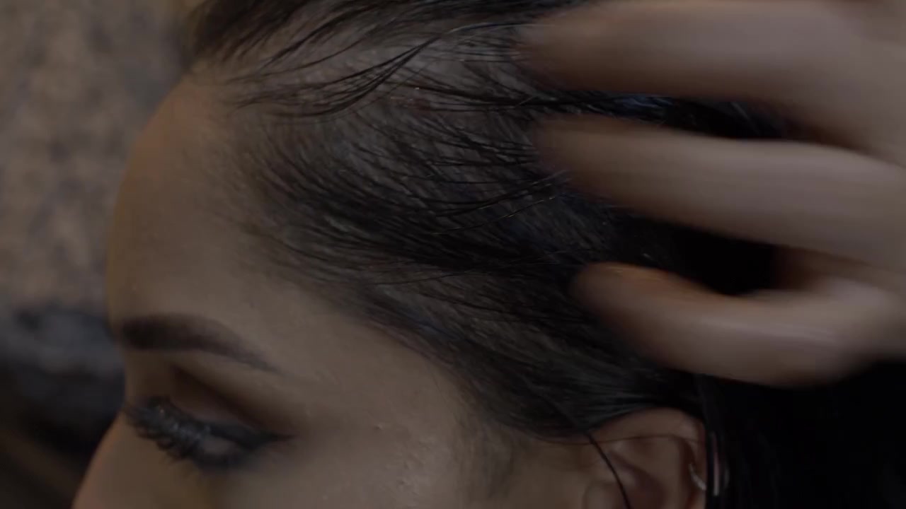 Young Asian Female Getting Oil Massaged By Hand Into Her Scalp And Hair. Locked Off, Side View