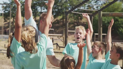group of caucasian boys and girls at boot camp together