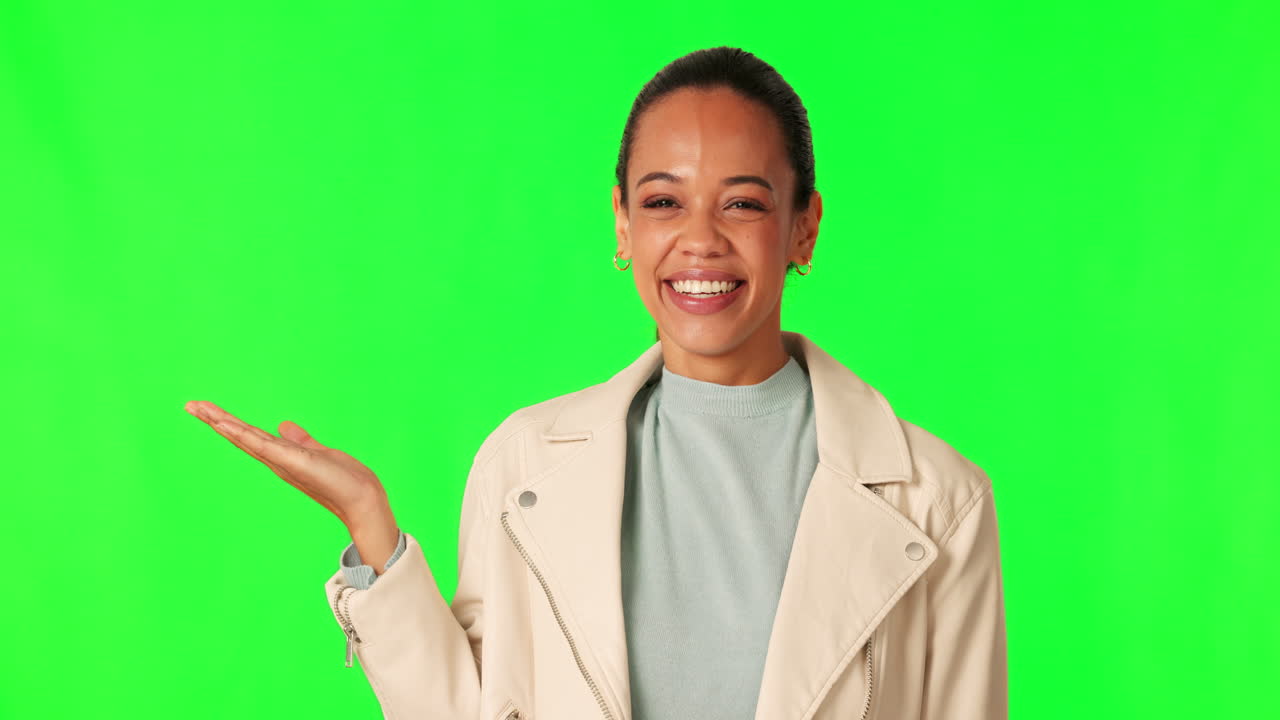 Green screen, hand holding
