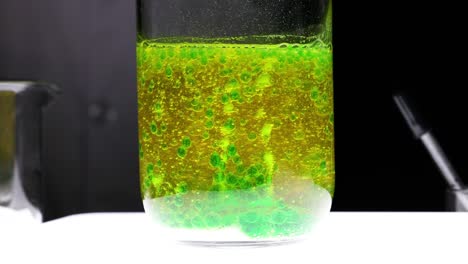 colorful liquid experiment in a glass