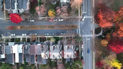 slow motion top down aerial of traffic at intersection