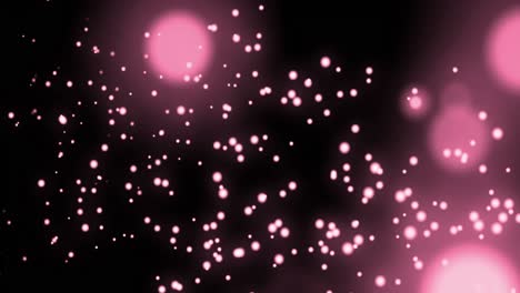 animation of multiple glowing pink spots of light moving in hypnotic motion on pink background