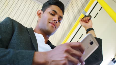 Man-using-mobile-phone-in-the-bus-4k