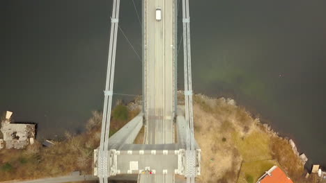 overhead aerial view of a suspension bridge in bergen norway spanning across a fjord