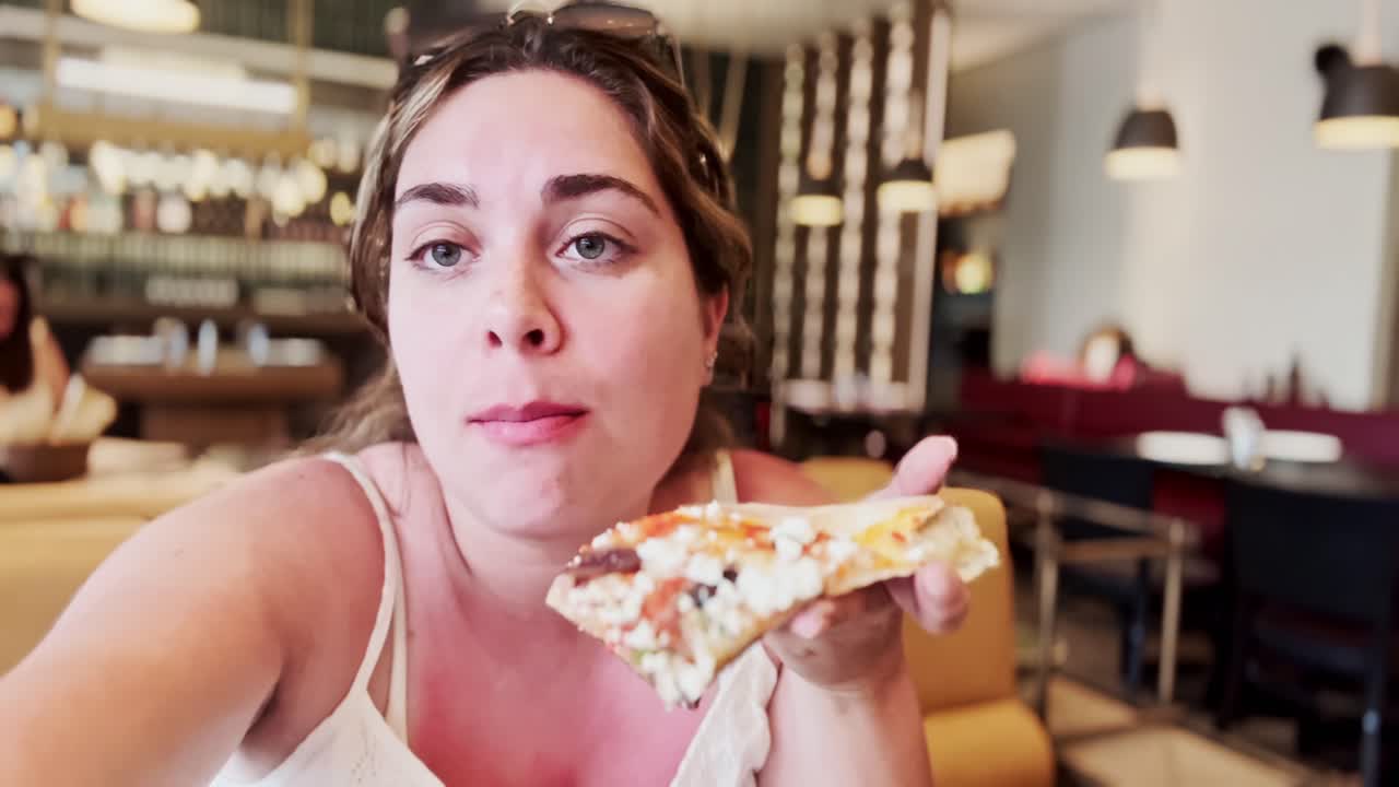 Tourist Woman Enjoying Delicious Pizza Meal During Athens Visit