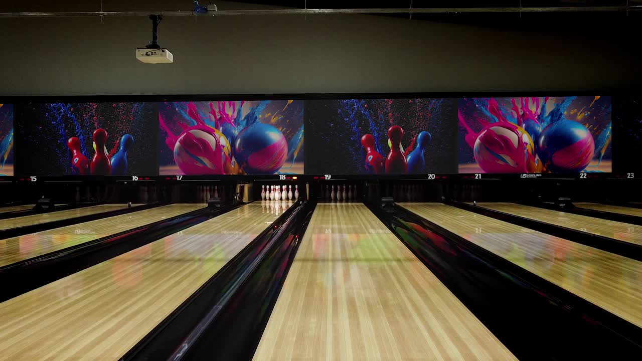 Pista da bowling con grafiche a schizzi di vernice colorati