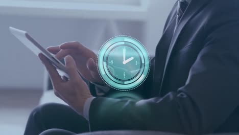 animation of clock moving over hands of caucasian businessman using tablet