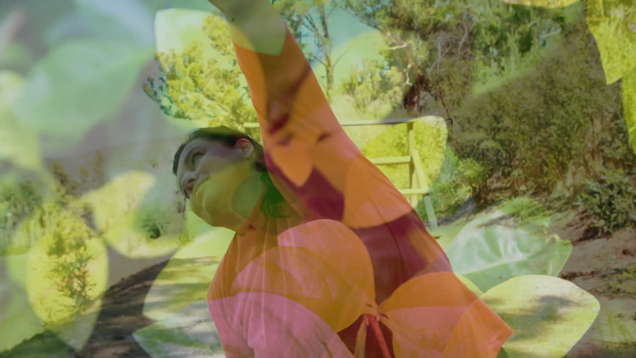 In sunny park, person stretching with colorful abstract shapes overlaying animation