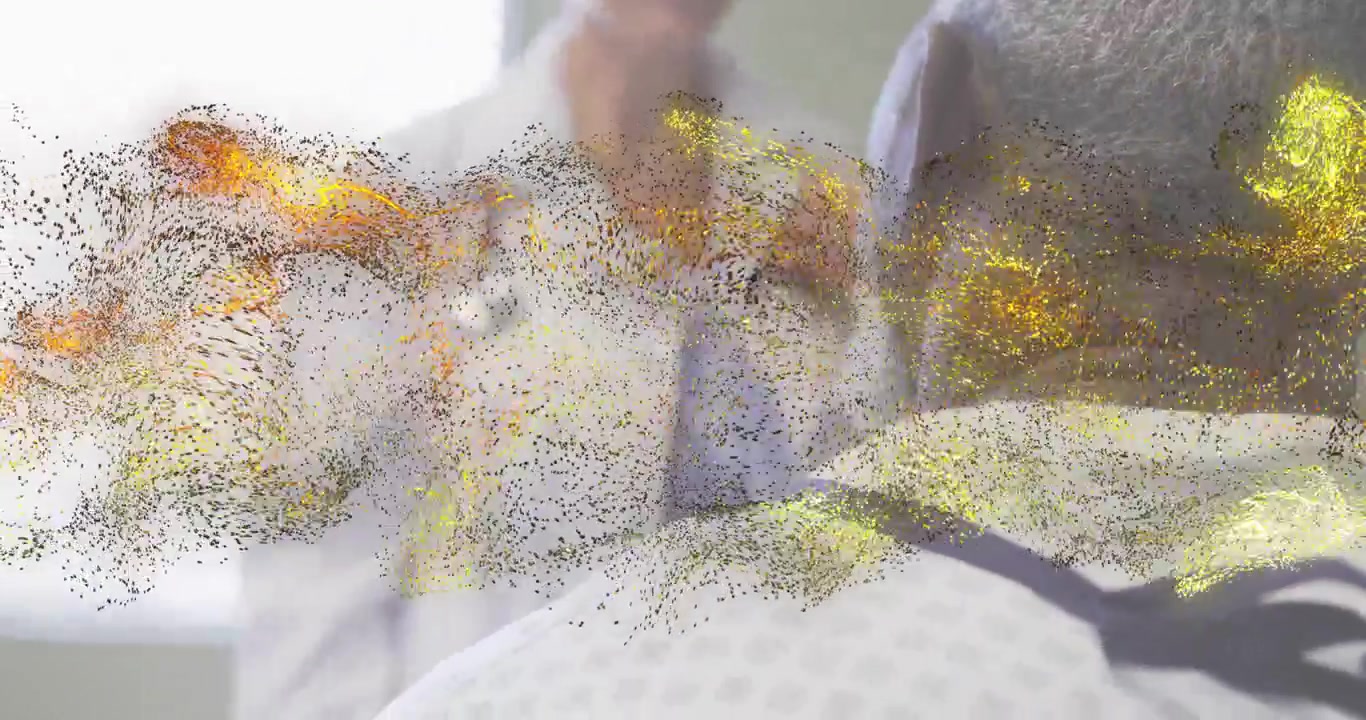 Gule partikler forsvinner og avslører en klinikk med en kvinnelig lege som gestikulerer til en pasient mens hun bruker stetoskop