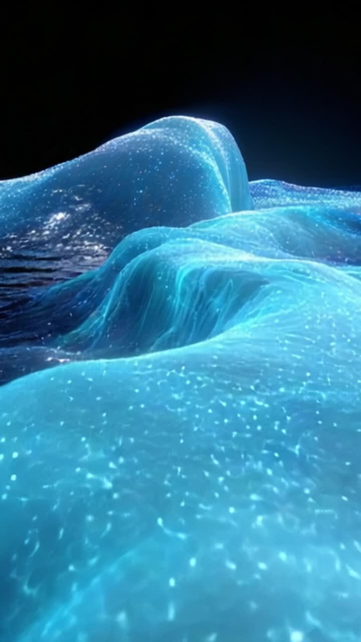 Una vista ipnotizzante di onde eteree che luccicano con particelle luminose, creando un'atmosfera accattivante e tranquilla di sfumature blu incandescenti in una distesa scura.