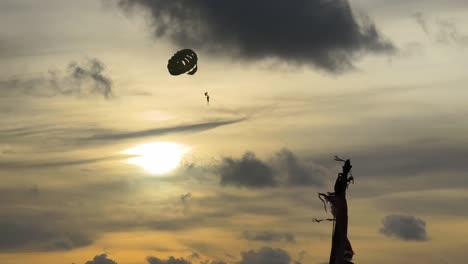 parasailing at sunset