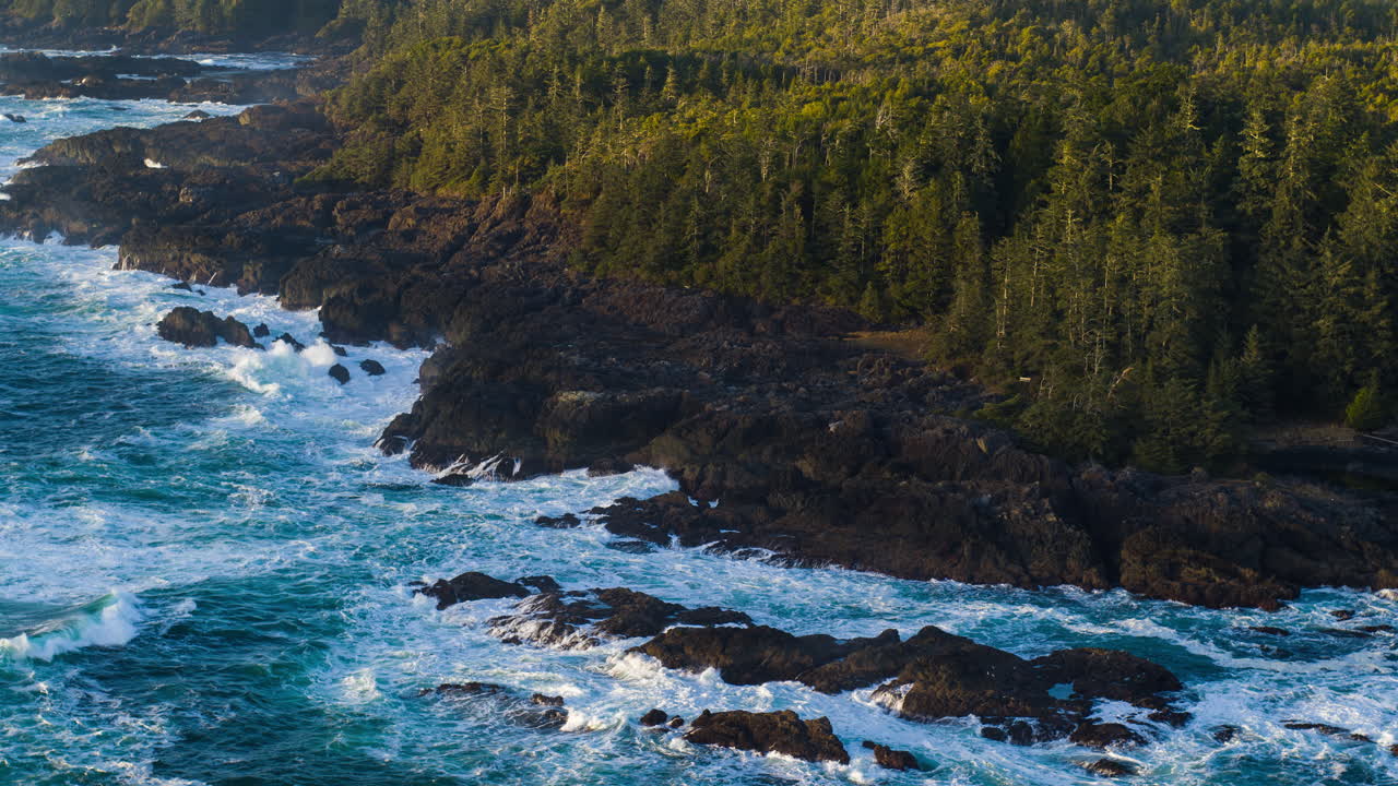 Drone video at sunset in Ucluelet British Columbia, Canada over the ocean and forest