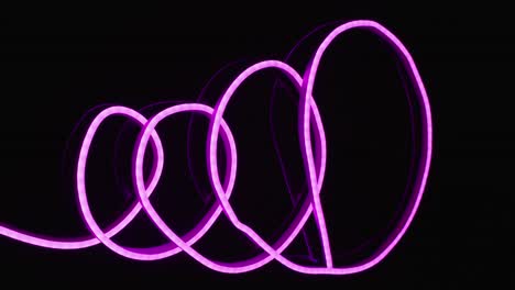 animation of pink neon lights forming spiral over black background