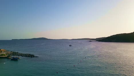 Panoramic-drone-shot-of-Punta-Molentis-Beach-at-sunset,-Villasimius,-South-Sardinia,-Italy