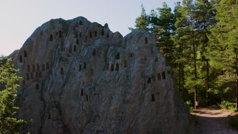 panning from the right to the left side of the frame, showing the beehive-lik rock foramtion of the eagles rock also known locally as orlovi skali, located in rhodope mountain in bulgaria