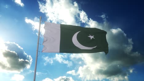 bandera de pakistán ondeando en el viento contra el hermoso cielo azul