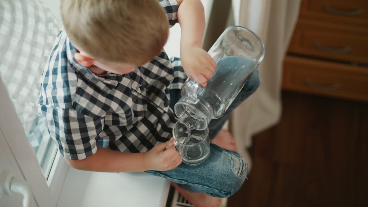 Child pouring water