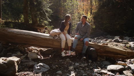couple enjoying a scenic autumn hike in a forest