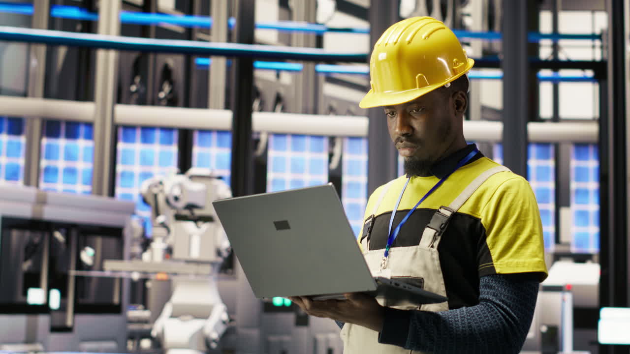 Vertical video Smart factory specialist, testing automated systems, monitoring production
